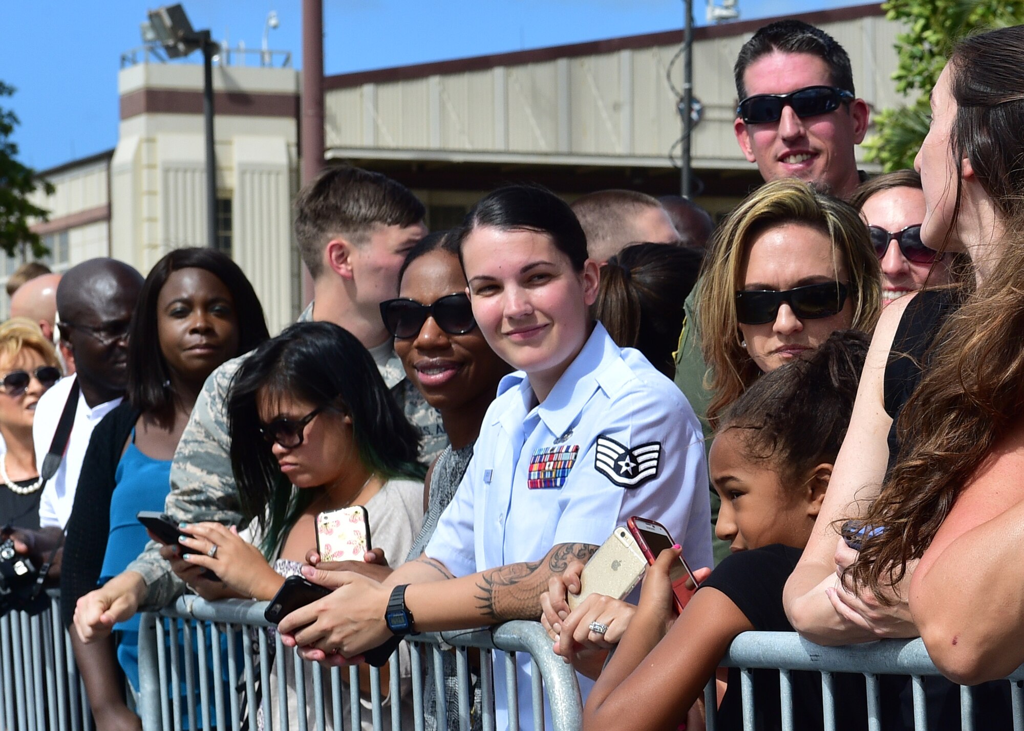 Military members and their families gather to see President Barack Obama’s departure from Joint Base Pearl Harbor-Hickam, Hawaii, Sep. 2, 2016. President Obama was in Hawaii to speak at the Pacific Island Conference of Leaders and the International Union for Conservation of Nature World Conservation Congress. (U.S. Air Force Photo by Tech. Sgt. Aaron Oelrich/Released)