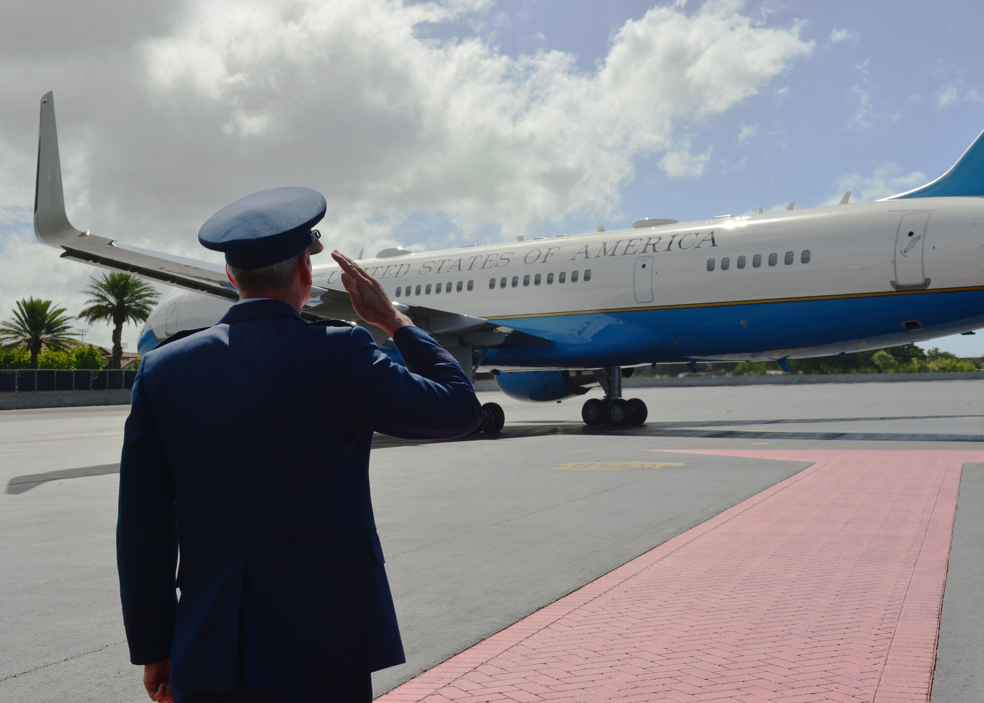 Gen. Terrence O’Shaughnessy, Pacific Air Forces commander, salutes Air Force One as it taxis on Joint Base Pearl Harbor-Hickam, Hawaii, Sep. 1, 2016. President Barack Obama was in Hawaii to speak at the Pacific Island Conference of Leaders and the International Union for Conservation of Nature World Conservation Congress. President Obama departed JBPHH on his way to Midway Atoll. (U.S. Air Force Photo by Tech. Sgt. Aaron Oelrich/Released)