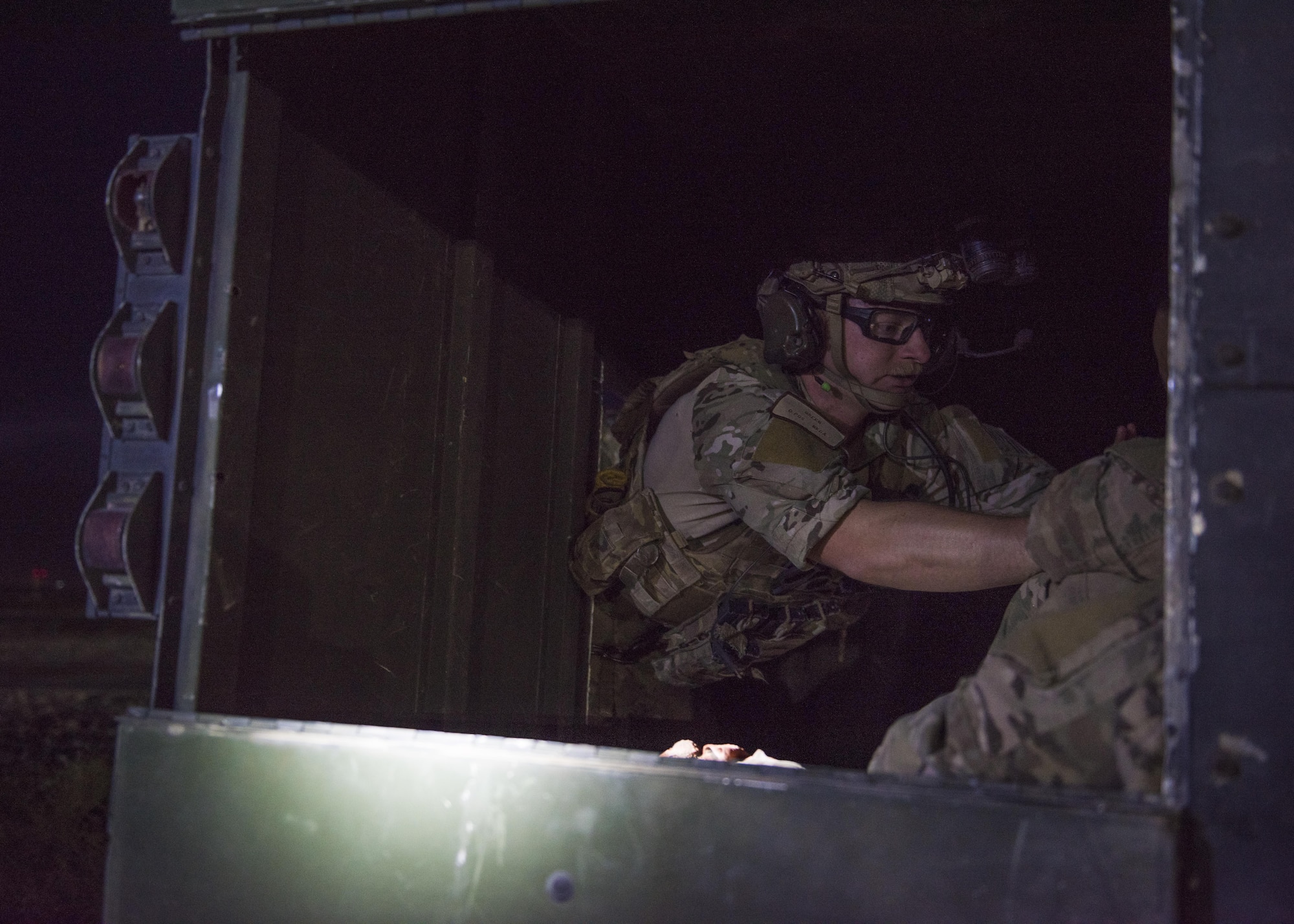 Staff Sgt. Kyle Green, 83rd Expeditionary Rescue Squadron pararescue specialist, attends to a simulated wounded patient during a joint integration mass casualty exercise, Bagram Airfield, Afghanistan, Aug. 31, 2016. Pararescue specialists perform rescues in every type of terrain and partake in every part of the mission, from search and rescue, to combat support and providing emergency medical treatment. The 83rd ERQS paired with soldiers from the 717th Explosive Ordinance Disposal Unit to increase interoperability with each other and demonstrate explosive ordinance operations and theater personnel recovery capabilities. (U.S. Air Force photo by Senior Airman Justyn M. Freeman)