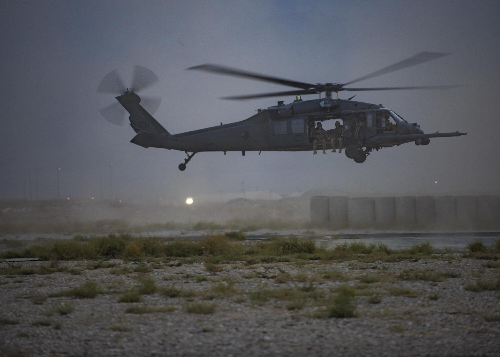 An HH-60G Pave Hawk rescue helicopter transports pararescue specialists during a joint integration mass casualty exercise, Bagram Airfield, Afghanistan, Aug. 31, 2016. During the exercise, pararescue specialist loaded simulated wounded patients into the helicopters to be evacuated to safety and treatment. (U.S. Air Force photo by Senior Airman Justyn M. Freeman)