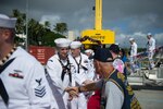 160901-N-LY160-150 JOINT BASE PEARL HARBOR-HICKAM, Hawaii (September 1, 2016) Members of the Submarine Veterans Bowfin Base welcome home Sailors, assigned to the Virginia-class fast-attack submarine USS Mississippi (SSN 782), following the completion of her maiden deployment to the western Pacific Ocean. (U.S. Navy photo by Mass Communication Specialist 2nd Class Michael H. Lee/Released)
