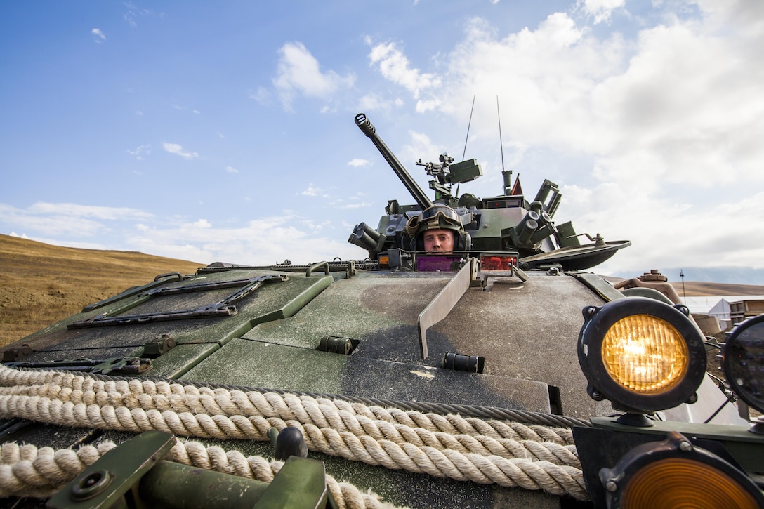 Marines demonstrate firepower on the range with M240 and .50 caliber machine guns alongside Light Armored Vehicles during Exercise Agile Spirit at Orpholo Training Area in Georgia, Sept. 3, 2016. Agile Spirit is an annual multinational exercise during which partners and allies strengthen security cooperation and promote regional stability. Marine Corps photo by Cpl. Kyle C. Talbot