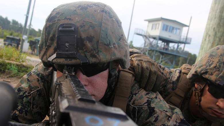 Marines with 2nd Low Altitude Air Defense Battalion, Marine Air Control Group 28, 2nd Marine Aircraft Wing prepare to fire the M240 Bravo machine gun during a live-fire training exercise conducted by 2nd LAAD at Marine Corps Base Camp Lejeune, N.C., Aug. 29-30. The exercise allowed Marines to re-familiarize themselves and qualify with the M-240 Bravo machine gun, M249 Squad Automatic Weapon, and the M2 Browning .50 caliber machine gun during the unknown distance live-fire exercise.