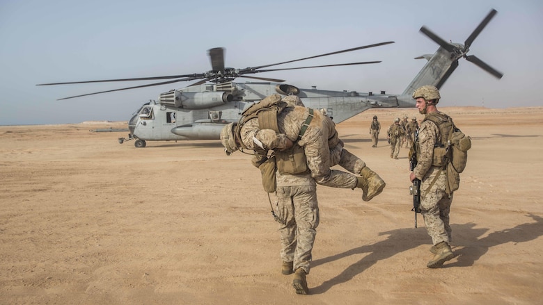 U.S. Marines with the 13th Marine Expeditionary Unit conduct a casualty collection drill during sustainment training in the 5th Fleet area of operations, June 18, 2016. The 13th MEU is conducting sustainment training to maintain proficiency and combat readiness while deployed with the Boxer Amphibious Ready Group during Western Pacific Deployment 16-1.