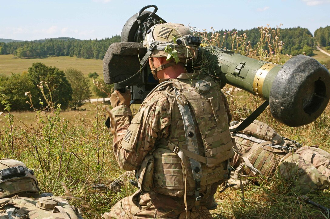 A soldier targets an approaching simulated enemy vehicle with a training Javelin shoulder-fired anti-tank missile while conducting defensive operations during exercise Combined Resolve VII at the Army’s Joint Multinational Readiness Center in Hohenfels, Germany, Sept. 2, 2016. Army photo by Pfc. Caleb Foreman