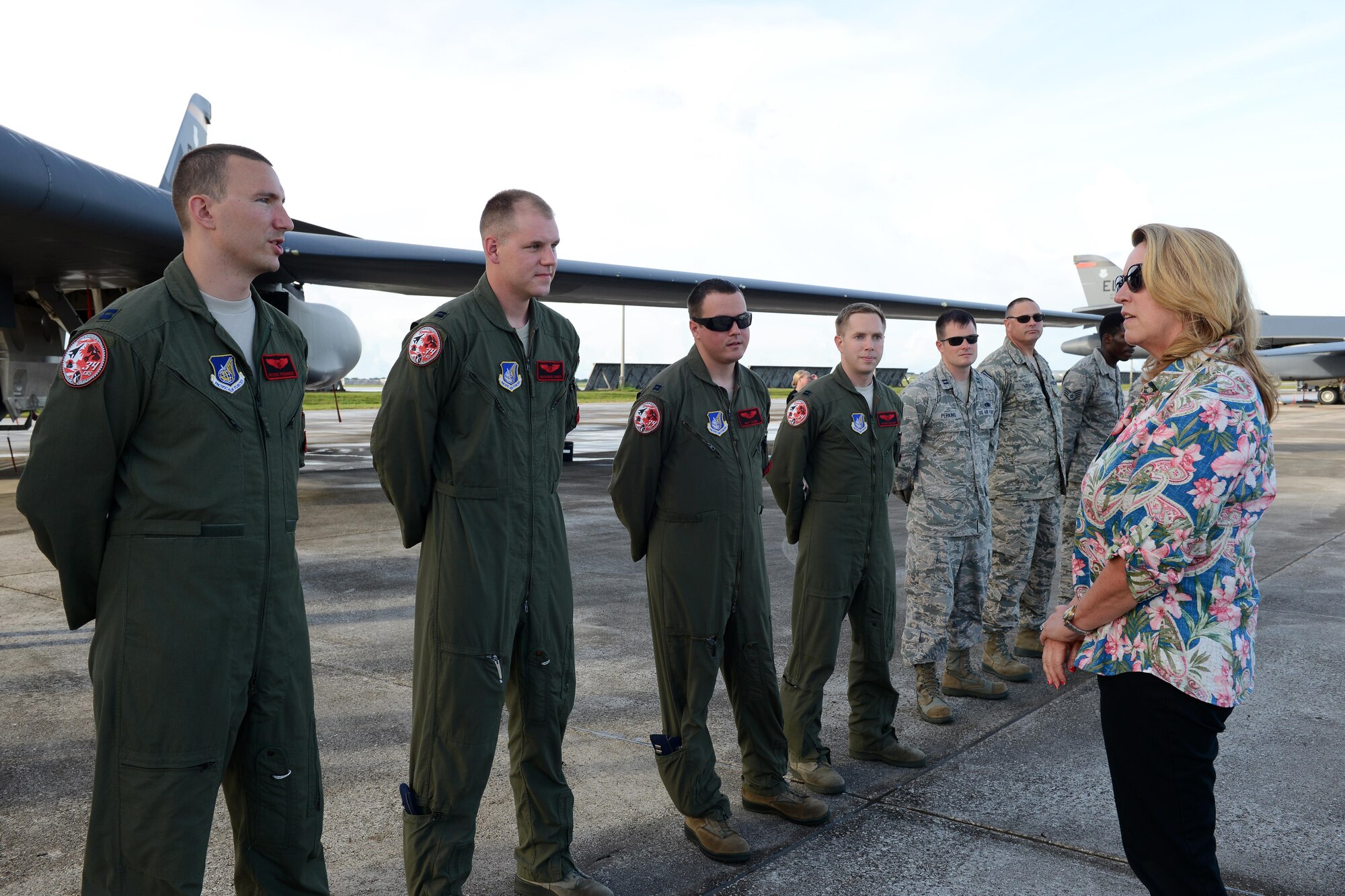 Secretary of the Air Force Deborah Lee James speaks with B-1B Lancer crew members and maintainers during a visit Aug. 30, 2016, at Andersen Air Force Base, Guam. During her visit, James learned more about the mission of the 34th Expeditionary Bomb Squadron while they are deployed executing the Continuous Bomber Presence mission. (U.S. Air Force photo by Airman 1st Class Arielle Vasquez/Released)