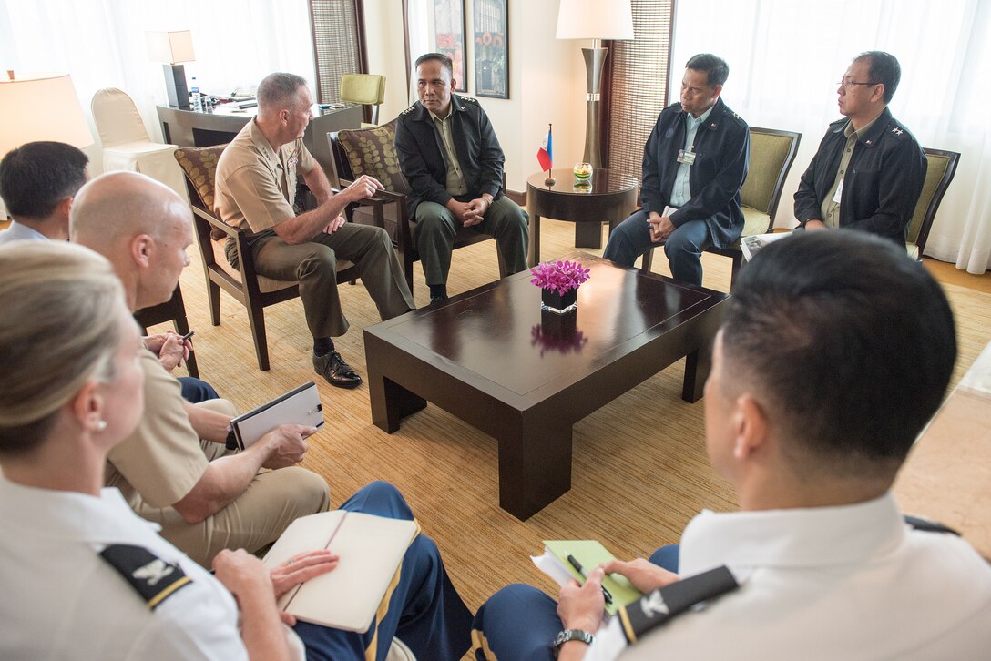 Marine Corps Gen. Joe Dunford, chairman of the Joint Chiefs of Staff, speaks with Philippine Armed Forces Chief of Staff Gen. Ricardo Visaya in Manila, the Philippines, Sept. 5, 2016. Dunford was in Manila to attend the 2016 Chiefs of Defense Conference. DoD photo by Army Sgt. James K. McCann