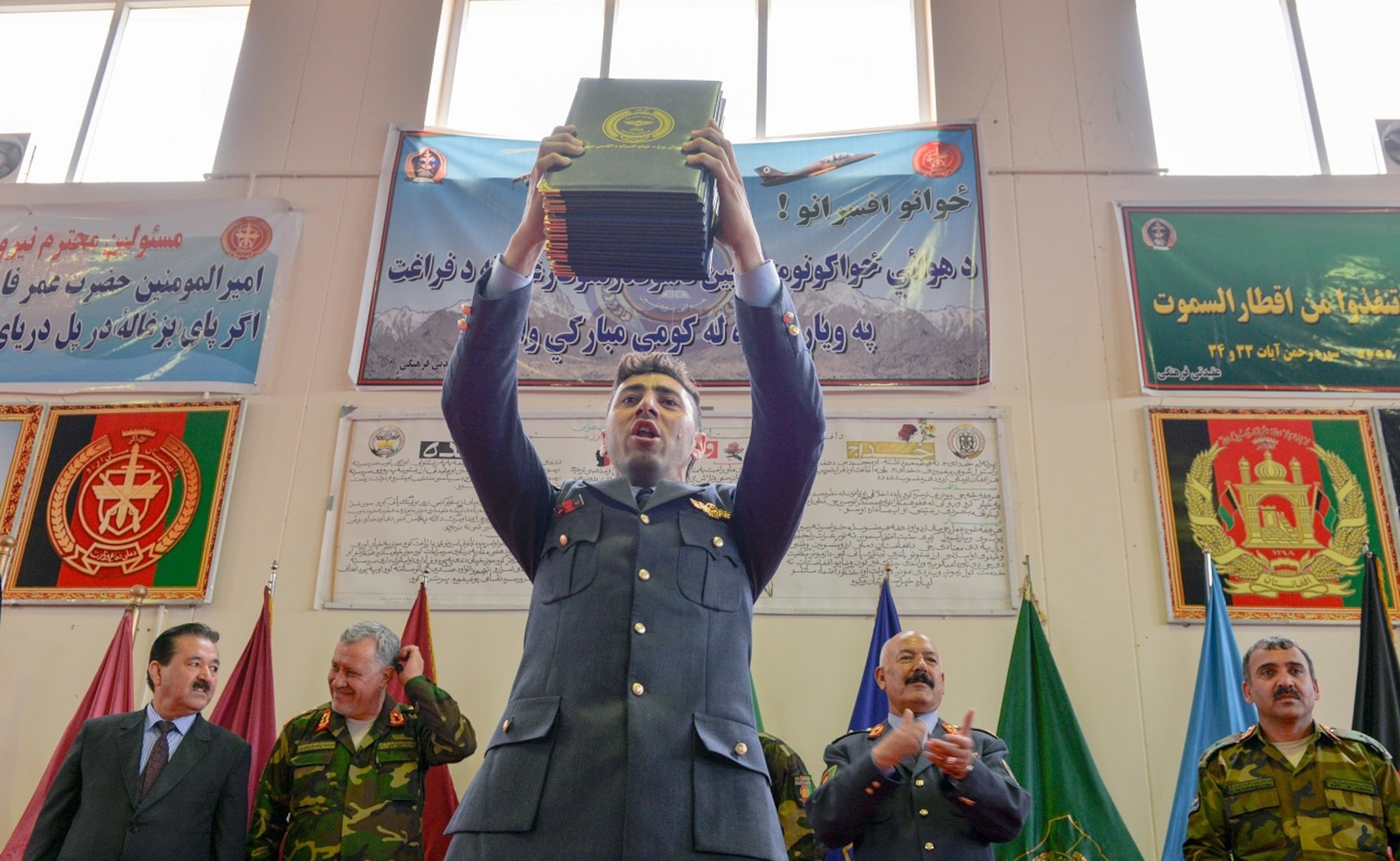 Afghan air force cadets graduated from the officer candidate school at Pohantoon-e-Hawayee, or Air University, during a ceremony in Kabul, Afghanistan, Sept. 1, 2016. Members of Train, Advise, Assist Command-Air (TAAC-Air) work with PeH and the Afghan air force to help build upon the AAF’s warfighting capabilities. (U.S. Air Force photo by Tech. Sgt. Christopher Holmes)