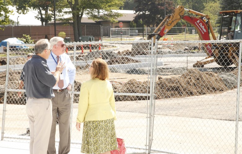 Jim Conway explains an ongoing project to Director of Military Programs, Mr. Lloyd Caldwell, and NAD's Linda Monte on the tour on Hanscom Air Force Base.