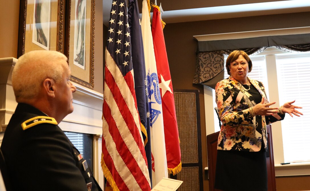 Army Lt. Gen. (Retired) Susan Lawrence (right) addresses Maj. Gen. Lawrence "Wayne" Brock III, recent commander of the 311th Signal Command (Theater) and former commander of the 335th Signal Command (Theater) in Greer, South Carolina during a retirement ceremony for Brock Sept. 1.  Brock served more than 36-years of honorable and faithful service in the Army Reserve and Army National Guard.