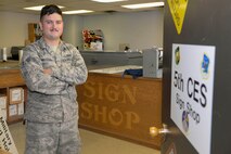 Senior Airman Michael Muldoon, a structural journeyman assigned to the 5th Civil Engineer Squadron, poses for a photo at Minot Air Force Base, N.D., Aug. 10, 2016. Muldoon created over 70 signs for Northern Neighbors Day 2016 scheduled for Aug. 13, 2016. (U.S. Air Force photo/Airman 1st Class Jessica Weissman)