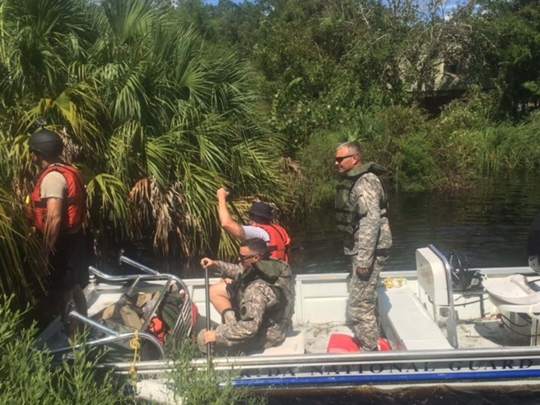 Members of the Florida National Guard partner with members of the Florida Fish and Wildlife Commission to aid in recovery efforts following Hurricane Hermine, which struck the state Sept. 2 as a Category 1 hurricane. Hermine was the first hurricane to impact Florida since 2005. Florida National Guard photo by Army Maj. Colleen Krepstekies