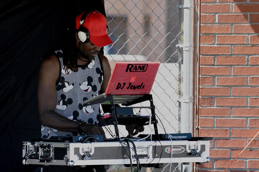 Mr. Julius Jones, 23d Force Support Squadron, dropped some beats during the Labor Day “Splash Party,” Sept. 5, 2016, at Moody Air Force Base, Ga. Jones laid down tracks throughout the event giving Airmen and their families a chance to bob their heads and show-off their dancing skills. (U.S. Air Force photo by Staff Sgt. Brian J. Valencia)