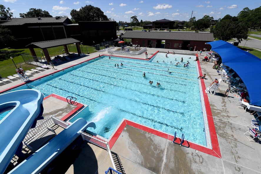 Airmen and their families enjoy a day at the pool during the Labor Day “Splash Party,” Sept. 5, 2016, at Moody Air Force Base, Ga. Labor Day is a federal holiday that pays tribute to the American workforce who serve as the backbone of this great nation. (U.S. Air Force photo by Staff Sgt. Brian J. Valencia)