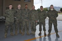 Commandant of the Marine Corps Gen. Robert B. Neller poses for a photo with Marine Security Guards at Marine Corps Embassy Honduras, Aug. 21, 2016. 
