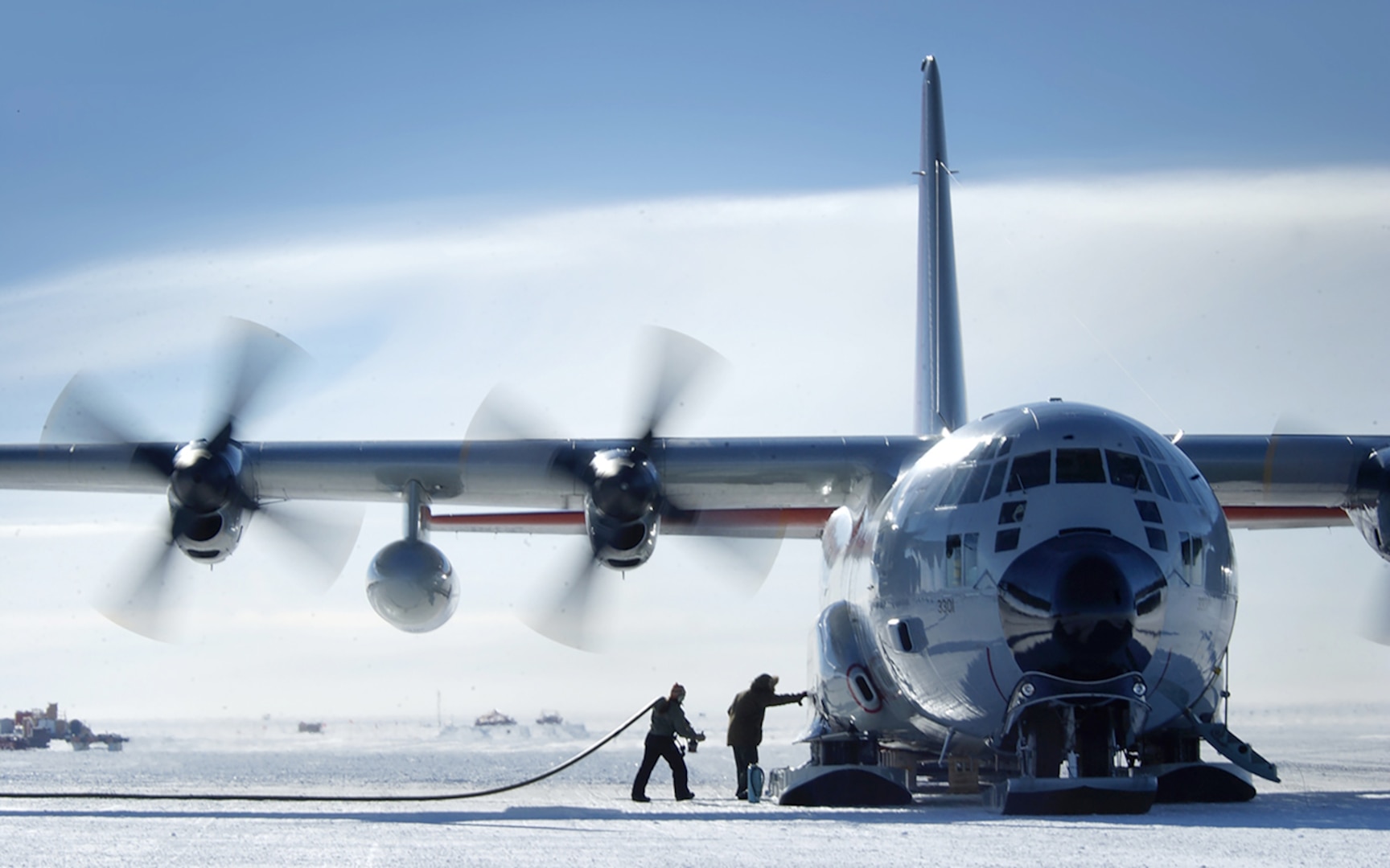 A New York Air National Guard LC-130 Hercules unloads DLA Energy-procured fuel supplied during a prior annual Operation Deep Freeze Antarctic refueling mission. The aircraft is used to deliver fuel and supplies to remote locations throughout the continent.