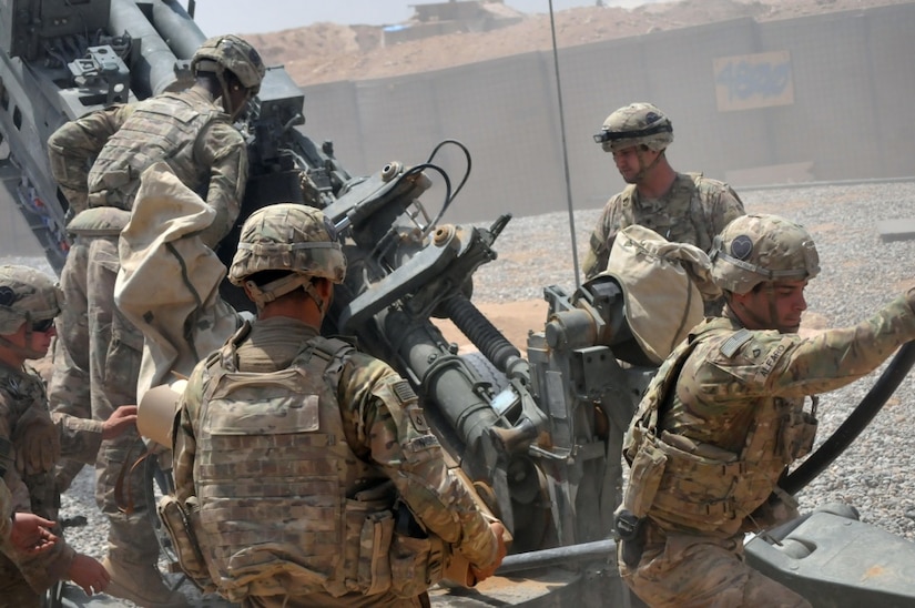 U.S. soldiers with Battery C, 1st Battalion, 320th Field Artillery Regiment, Task Force Strike, load a high-explosive round into an M777 howitzer at Kara Soar Base, Iraq, Aug. 7, 2016. Battery C Soldiers support the Combined Joint Task Force – Operation Inherent Resolve mission by providing indirect fire support for Iraqi security forces as they continue to combat the Islamic State of Iraq and The Levant and retake terrain. The assistance and support these soldiers provide demonstrate the commitment of the United States as part of a coalition of regional and international nations joined together to defeat ISIL and the threat they pose to Iraq, Syria, the region and the wider international community. Army photo by 1st Lt. Daniel Johnson