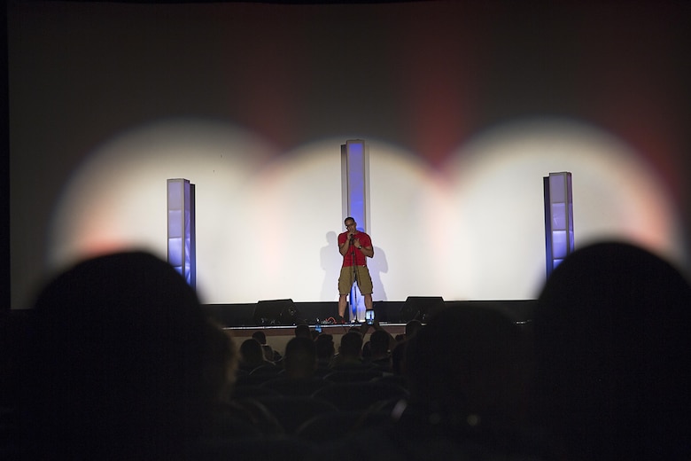 Lance Cpl. Brian Quinones, warehouse clerk, Combat Logistics Company 13, competes in the Single Marines Program’s 7th Annual Marines Got Talent Show at the Sunset Cinema, Aug. 12, 2016. The event is held to give service members the opportunity to show their talent with the rest of the Combat Center community. (Official Marine Corps photo by Cpl. Thomas Mudd/Released)