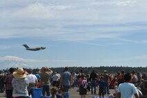 A McChord C-17 Globemaster III departs the McChord Field runway during the Joint Base Lewis-McChord Airshow and Warrior Expo Aug. 28, 2016, at JBLM, Wash.  Thousands watched as the C-17 conducted an airdrop to show case the 62nd Airlift Wing’s mission to deliver safe and reliable global airlift. (U.S. Air Force photo/Staff Sgt. Naomi Shipley)