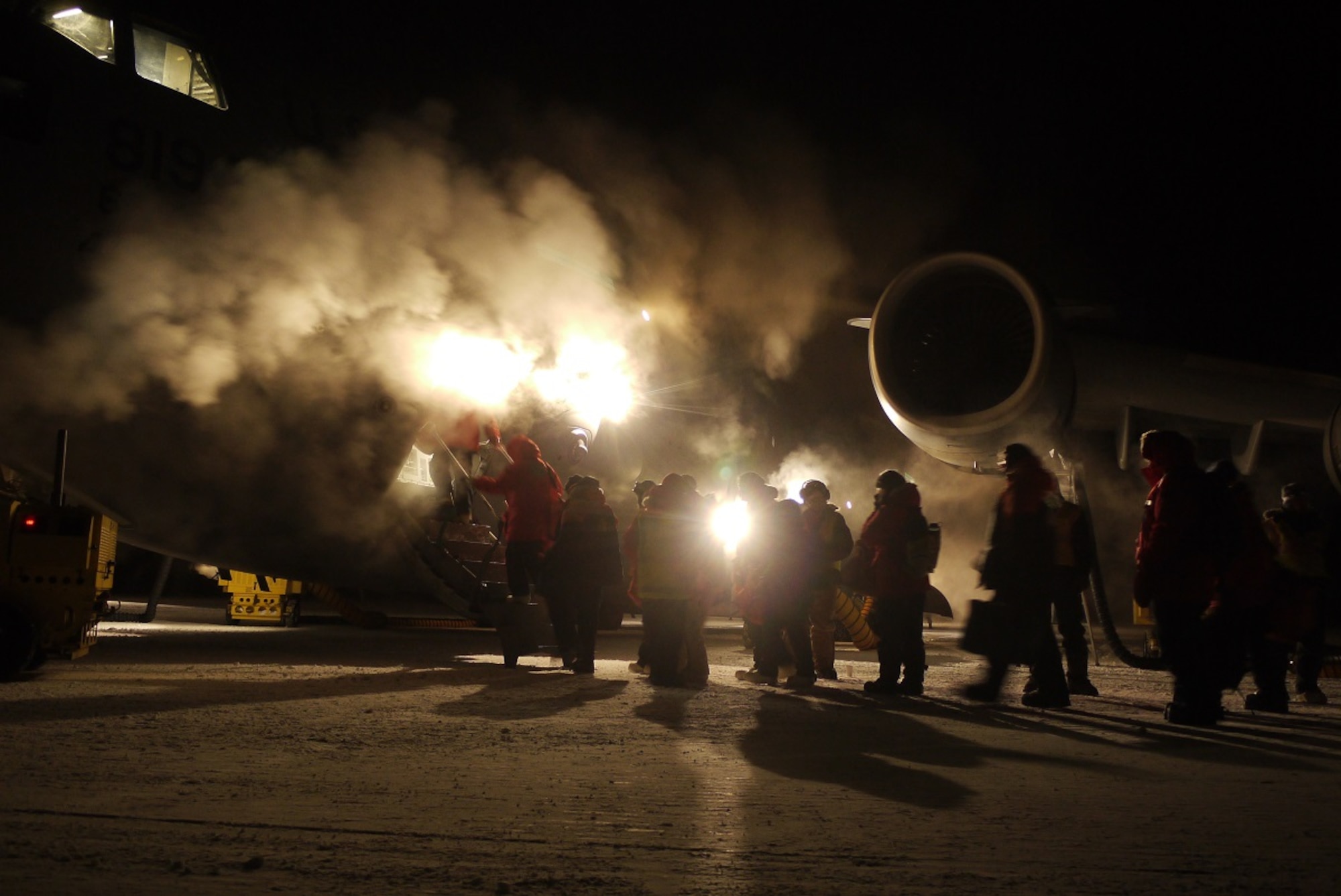 Members of the National Science Foundation load onto a McChord C-17 Globemaster III during WinFly Aug. 26, 2016 at McMurdo Station, Antarctica. The NSF personnel were transported to Chistchurch International Airport, New Zealand for the upcoming main season of Operation Deep Freeze. Christchurch is the starting point for forward deployment to McMurdo Station, Antarctica. (Courtesy photo)