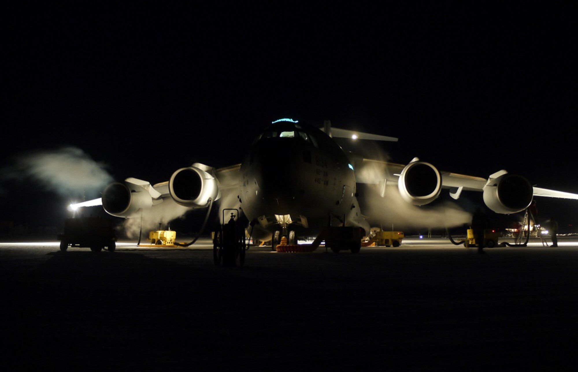 62nd Aircraft Maintenance Squadron Airmen service a McChord C-17 Globemaster III during WinFly Aug. 27, 2016 at McMurdo Station, Antarctica. The 62nd Airlift Wing began the winter flying as part of its support of the U.S. Antarctic Program and the National Science Foundation. The crew transported NSF personnel and cargo to Chistchurch International Airport, New Zealand. (Courtesy photo)