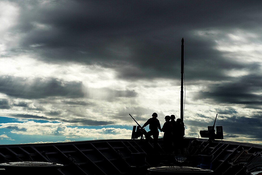 Sailors stand watch aboard the guided-missile cruiser USS Chancellorsville as the ship returns to Fleet Activities Yokosuka, Japan, Aug. 30, 2016. The Chancellorsville is deployed to the U.S. 7th Fleet area of operations to support security and stability in the Indo-Asia-Pacific region. Navy photo by Petty Officer 2nd Class Andrew Schneider