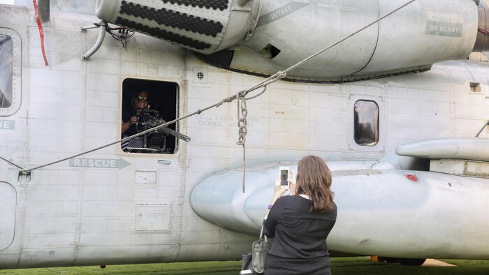 Amanda Stravinsky, right, takes a photo of Alisa Kessler, left, inside of a CH-53E Super Stallion Helicopter during a static display in Nashville, Tenn., Sept. 6. Marine Week Nashville is an opportunity for the people of the greater Nashville area to meet Marines and learn about Corps’ history, traditions and value to the nation.