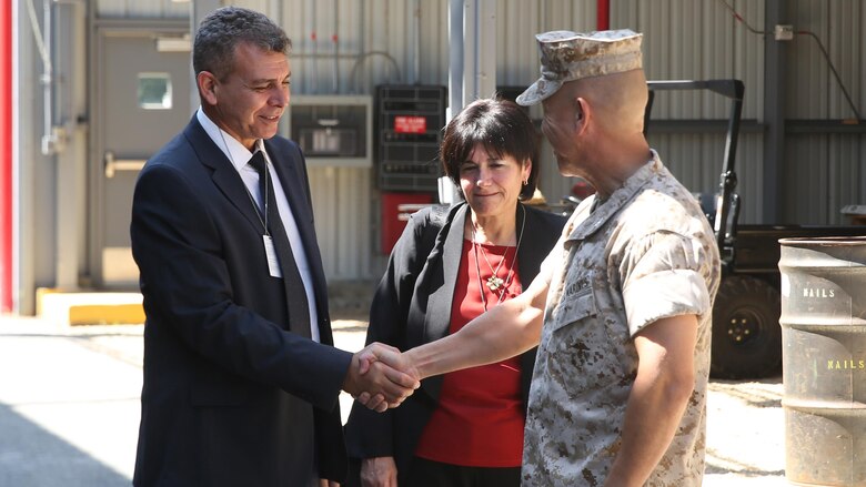 Marine Col. Michael Carter, right, commanding officer of Chemical Biological Incident Response Force, CBIRF, greets Esther Krasner, center, director of chemical, biological, radiological and nuclear (CBRN) Defense Division, and retired Israeli Defense Force Brig. Gen. Moshe Edri, left, Assistant Minister of Defense for CBRN Defense, Government of Israel, during an official visit Aug. 29, 2016. Edri and the other officials with the Israeli Ministry of Defense’s CBRN Defense visited Marines and sailors with CBIRF to learn about their operation techniques in a contaminated environment. (Official USMC Photo by Sgt. Jonathan Herrera/Released)