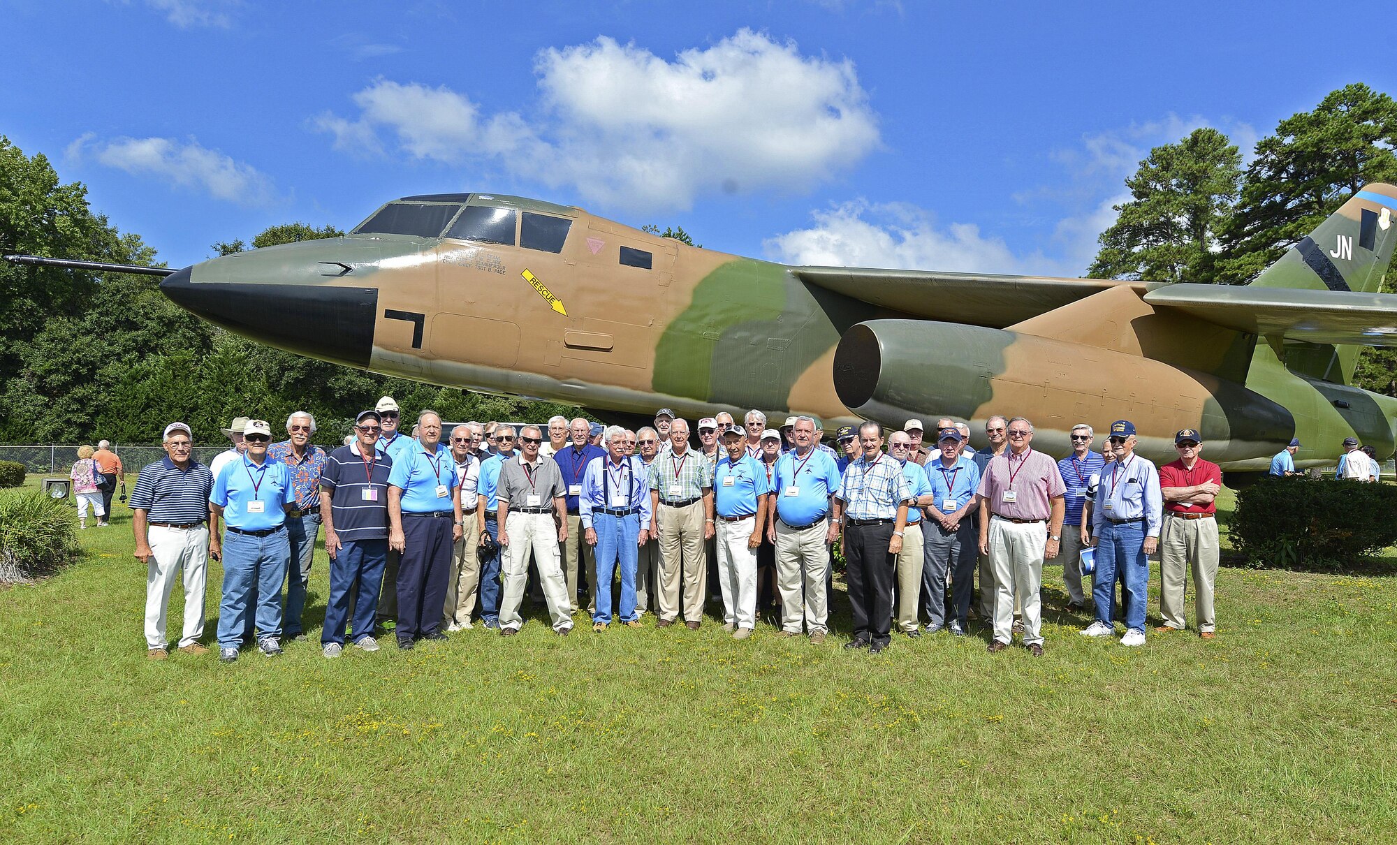 U.S. Air Force retired B-66 Destroyer aircraft crew members and pilots pose for a picture in front of a B-66 static display at Shaw Air Force Base, S.C., Aug. 30, 2016. The B-66 was a combat-ready light bomber that retained a three-man crew used by the USAF between the years of 1952 to 1966. (U.S. Air Force photo by Airman BrieAnna Stillman) 