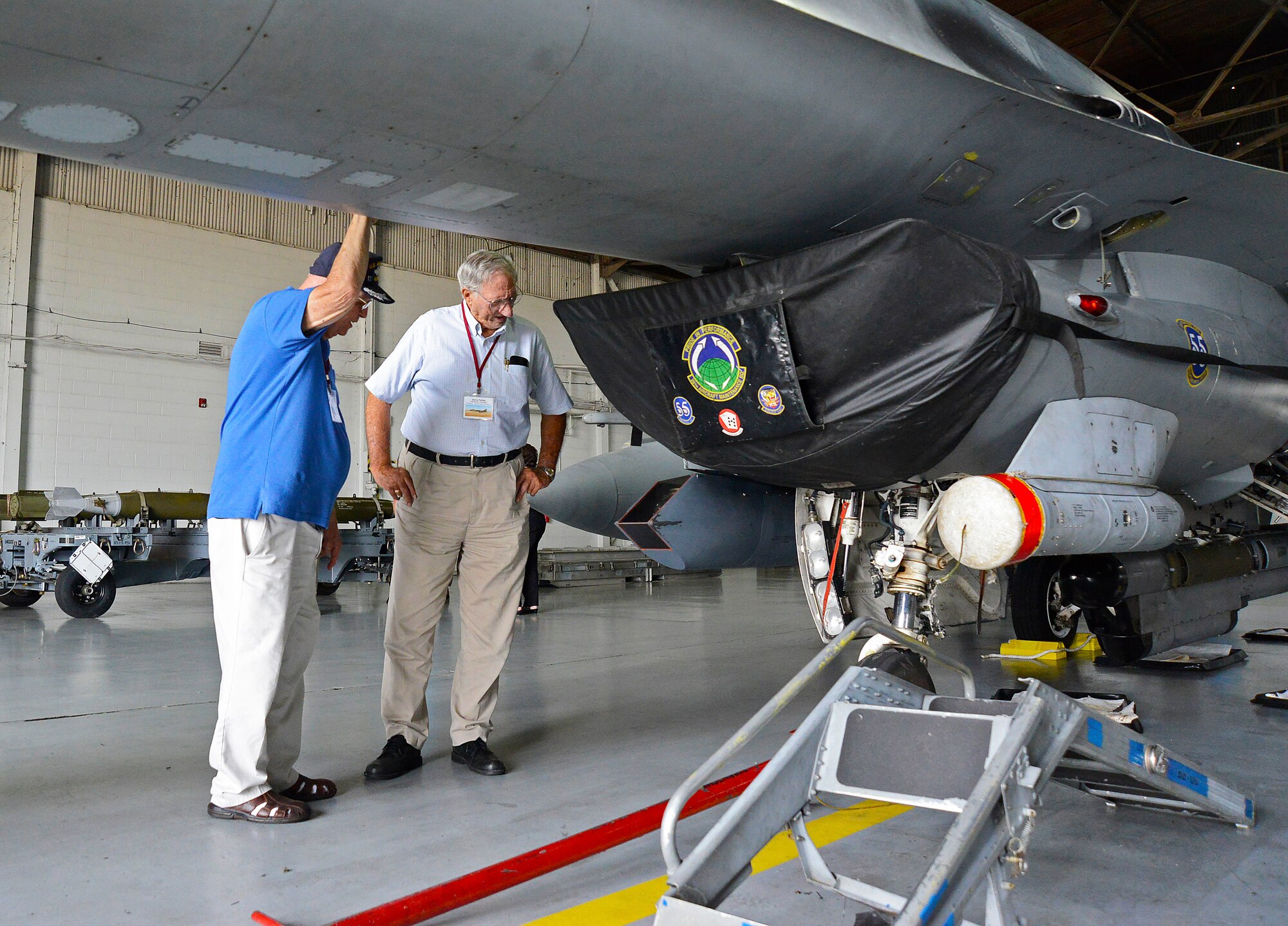 Two U.S. Air Force veterans take a closer look at a F-16 Fighting Falcon during a B-66 Destroyer reunion at Shaw Air Force Base, S.C., Aug. 30, 2016. Approximately 100 veterans from around the U.S. attended the reunion. (U.S. Air Force photo by Airman BrieAnna Stillman)  