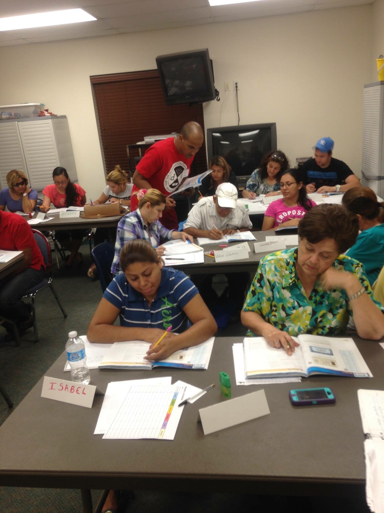 Staff Sgt.Jarius Wimberly teaches a citizenship class at Memorial Assistance Ministries in Houston, Texas, Aug. 18.