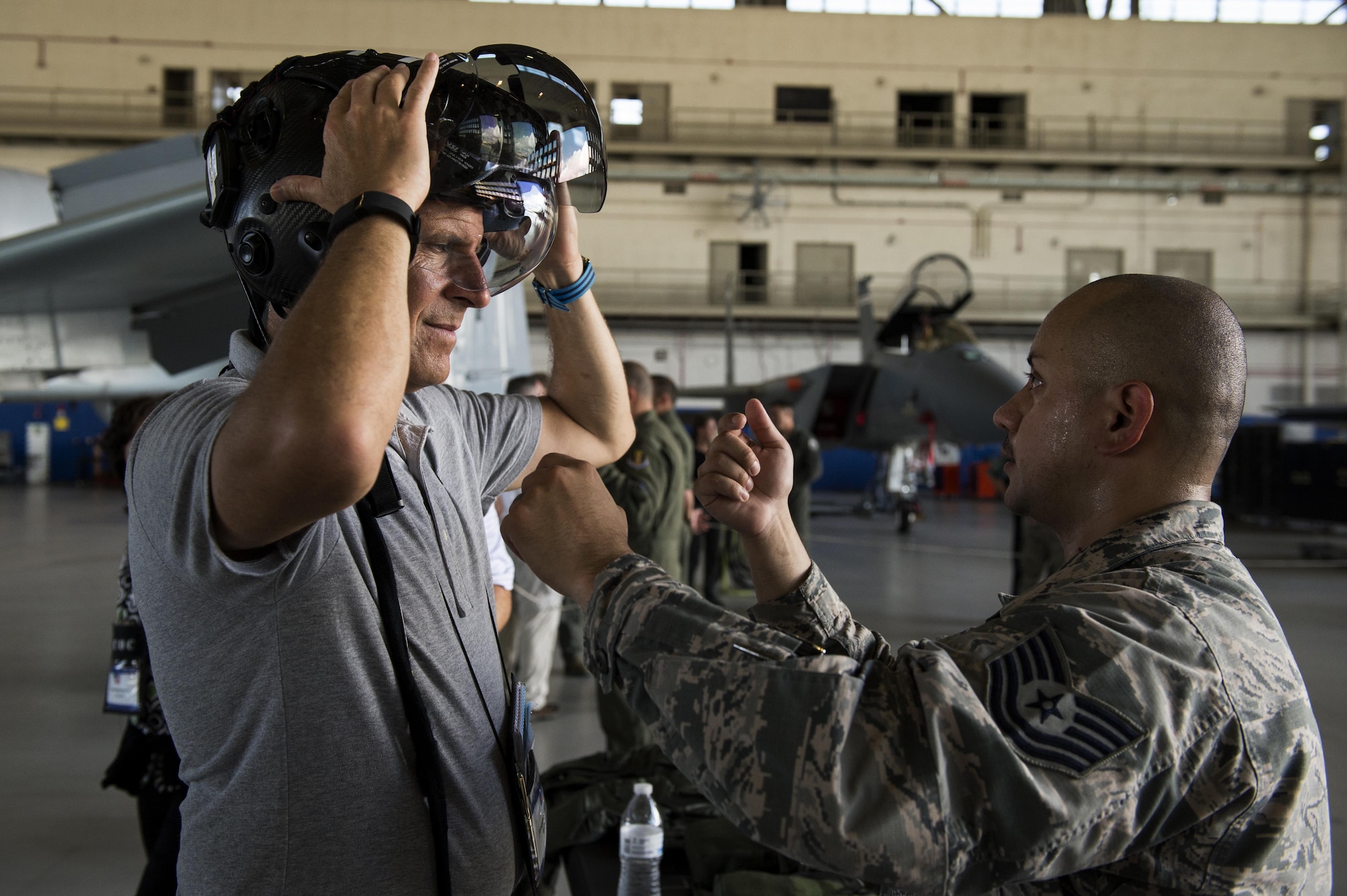 Jonathan Spalter, chairman of Mobile Future, Inc., experiences the F-35 helmet at Eglin Air Force Base, Fla.,  during Joint Civilian Orientation Conference, Aug. 17, 2016. JCOC increases public understanding of national defense by enabling American business and community leaders to directly observe and engage with the U.S. military. (DoD Photo by Marine Sgt. Drew Tech)