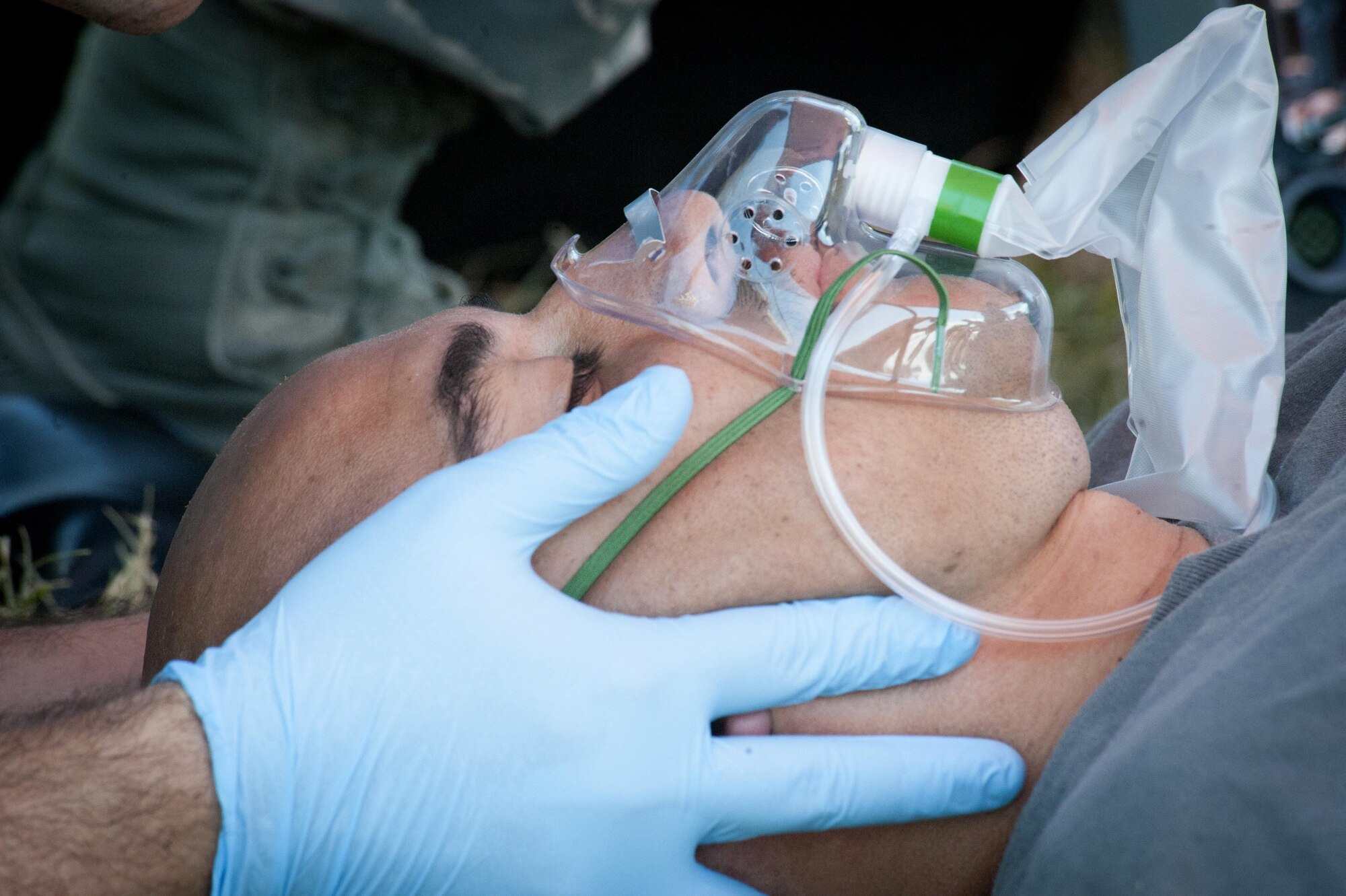 Emergency medical technicians assigned to Eglin Air Force Base, Fla., treat a simulated alcohol withdrawal syndrome patient  during the 2016 EMT Rodeo Aug. 26, 2016 at Cannon Air Force Base, N.M. Cannon’s EMT Rodeo tests the skills of medical professionals from across the Air Force through a series of innovative, high-pressure scenarios. (U.S. Air Force photo by Tech. Sgt. Manuel J. Martinez)