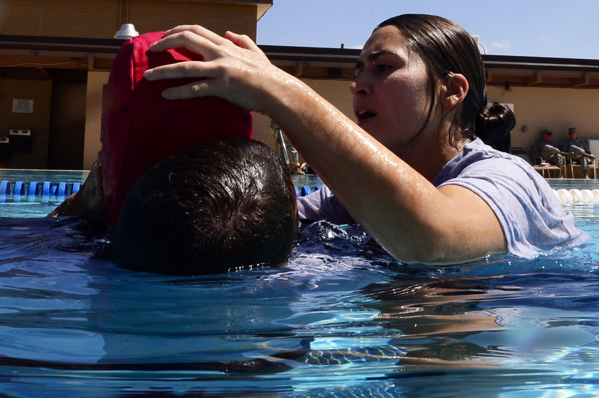 An emergency medical technician assigned to Eglin Air Force Base, Fla., rescue a simulated drowning victim during the 2016 EMT Rodeo Aug. 26, 2016 at Cannon Air Force Base, N.M. Cannon’s EMT Rodeo tests the skills of medical professionals from across the Air Force through a series of innovative, high-pressure scenarios. (U.S. Air Force photo by Tech. Sgt. Manuel J. Martinez)