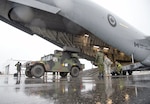 Members and equipment from the 263rd Army Air and Missile Defense Command arrive on board a C-17 Globemaster at 22 Wing North Bay, Ontario during the Vigilant Shield Air Defense Artillery exercise Aug. 13.