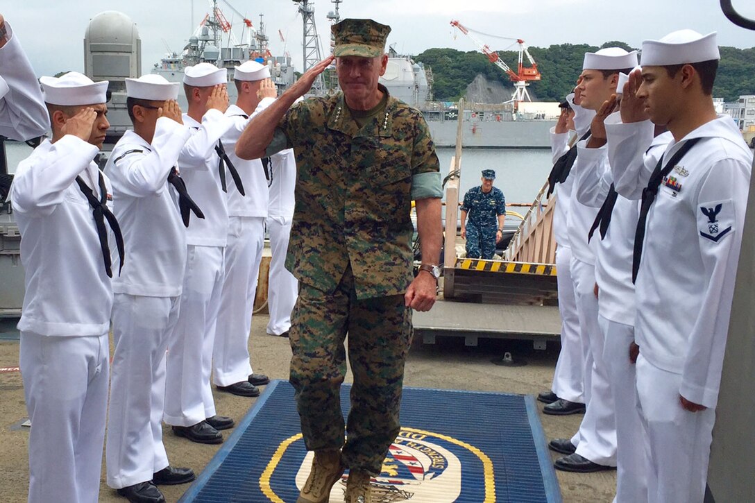 Marine Corps Gen. Joe Dunford, chairman of the Joint Chiefs of Staff, visits the USS Barry in Yokosuka, Japan, Sept. 7, 2016. The Barry is an Arleigh Burke-class guided missile destroyer deployed in the 7th Fleet area of operations to support stability and security missions in the Indo-Asia-Pacific region. DoD photo by Lisa Ferdinando