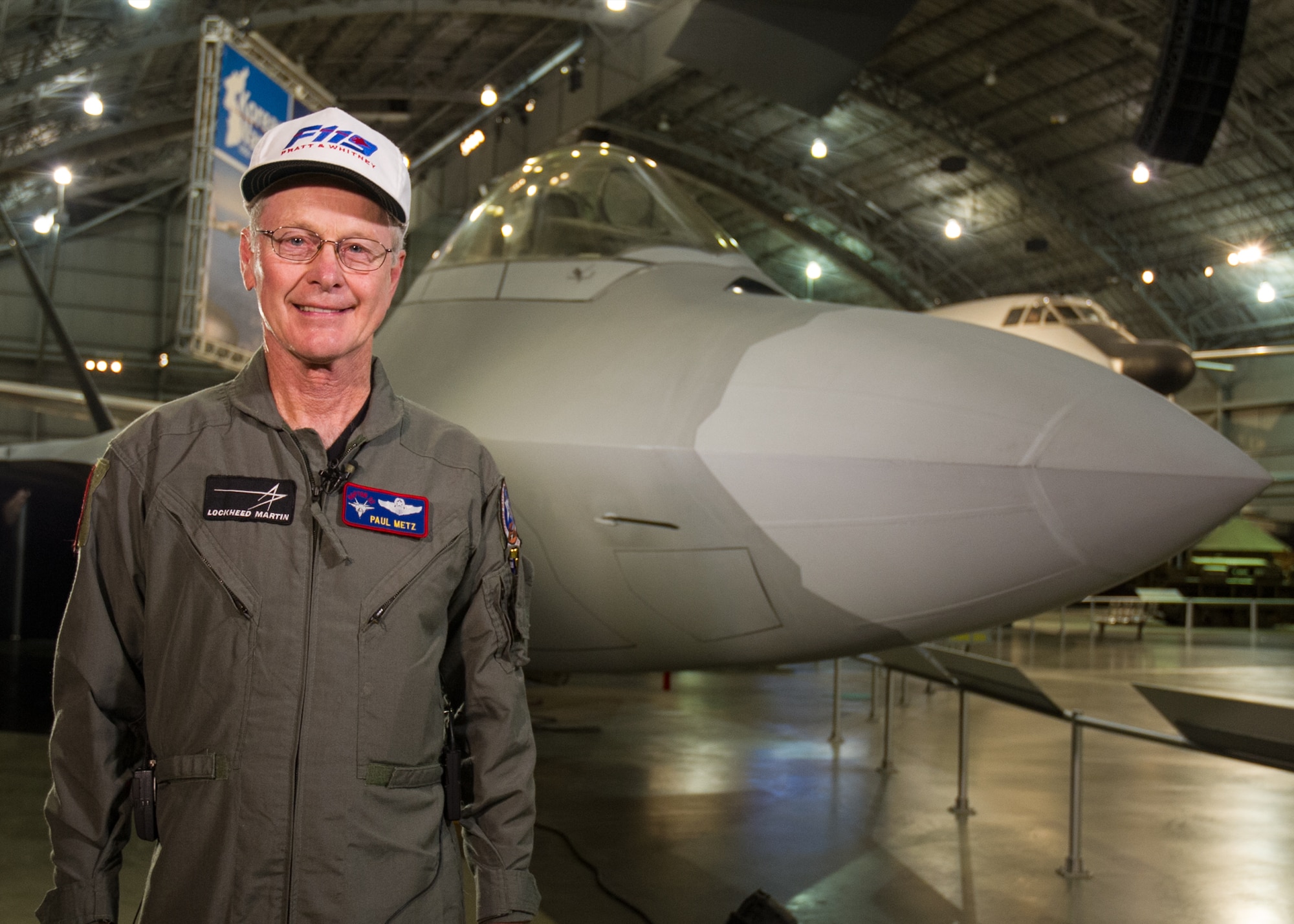 DAYTON, Ohio -- (Dec. 2015) Lockheed Martin test pilot Paul Metz standing in front of the F-22 that he flight tested in 1997. This aircraft is on display at the National Museum of the U.S. Air Force. (U.S. Air Force photo by Ken LaRock)