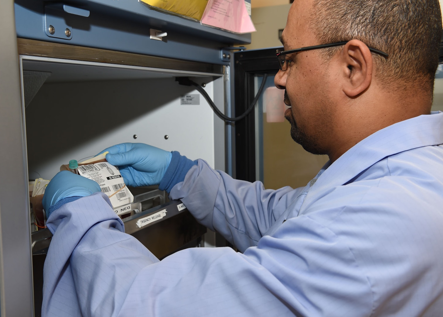 James Brown, 59th Diagnostics and Therapeutics Squadron medical lab technician, conducts a routine safety inspection on the emergency blood stock in the Wilford Hall Ambulatory Surgical Center main lab, August 16. The lab uses all of its resources, including fresh blood, to support a variety of research protocols for the Chief Scientist’s Office, Science and Technology. (U.S. Air Force photo/Tech. Sgt. Christopher Carwile/Released)