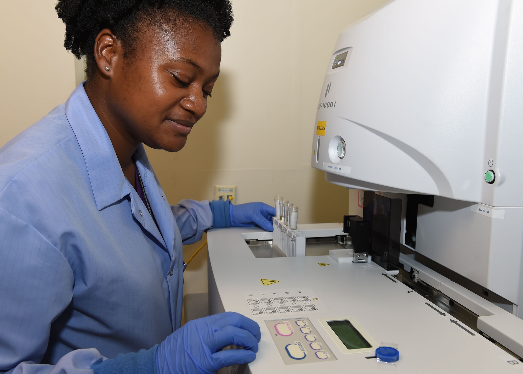 Hope Blanding, a 59th Diagnostics and Therapeutics Squadron medical lab technician, uses a Sysmex UF-1000i to run a microscopic analysis on samples in the Wilford Hall Ambulatory Surgical Center main lab, August 16. Devices like the Sysmex help to increase the accuracy and speed when processing sample for Science and Technology research projects. (U.S. Air Force photo/Tech. Sgt. Christopher Carwile/Released)