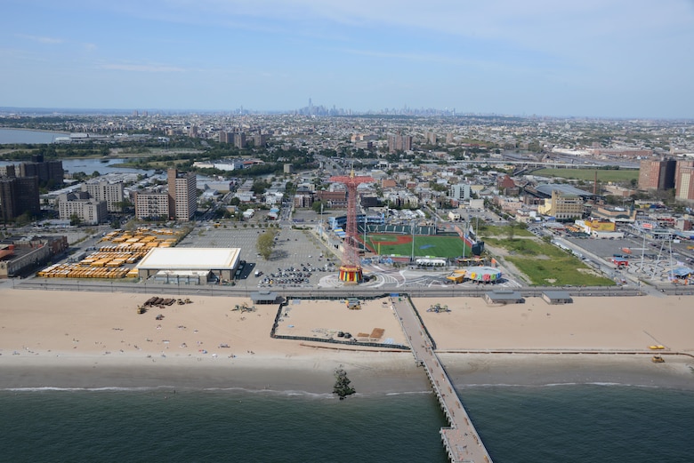 Sand replenishment work taking place on Coney Island Beach, New York. 
