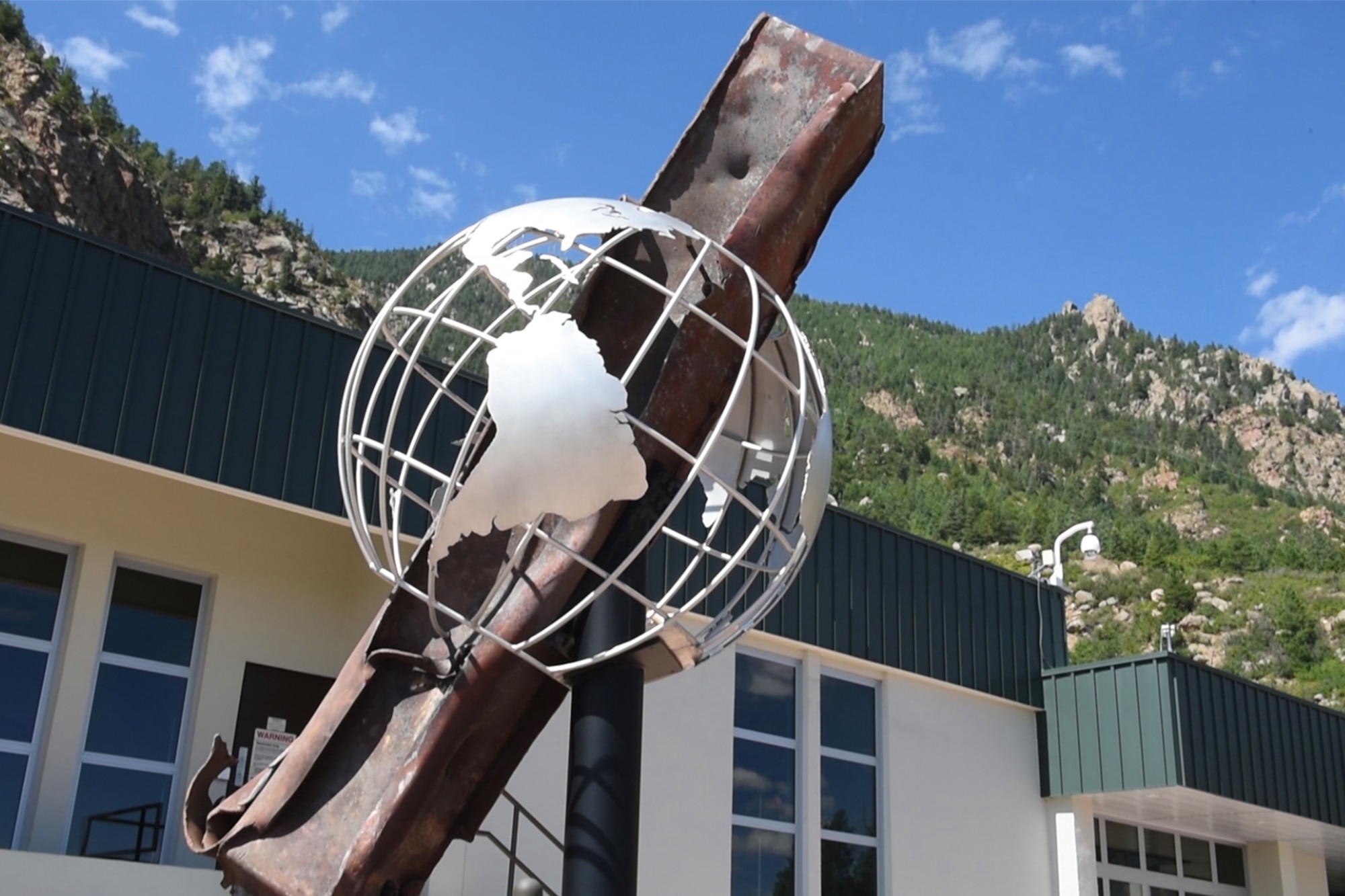 CHEYENNE MOUNTAIN AIR FORCE STATION, Colo. – A 9/11 memorial was placed at Cheyenne Mountain Air Force Station, Colo., Sept. 12, 2011. In an effort to celebrate the lives lost and educate younger Soldiers and Airmen on the effect Sept. 11 had on citizens and service members, Don Addy, The National Homeland Defense Foundation president, formally requested pieces from ground zero be donated to Colorado Springs military installations. (U.S. Air Force photo by Dave Meade)