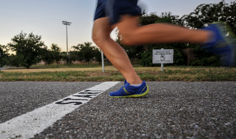 Senior Airman Rebecca Chamberlain, a paralegal with the 1st Special Operations Wing Legal Office, sprints on a track at Hurlburt Field, Fla., Aug. 30, 2016. Chamberlain is scheduled to participate in the half-marathon during the 20th Annual Air Force Marathon, Sept. 17, at Wright-Patterson Air Force Base, Ohio, as a member of the Air Force Special Operations Command’s team. (U.S. Air Force photo by Airman 1st Class Joseph Pick)