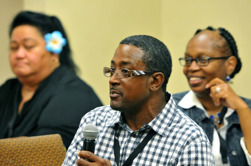 Reginald Howell (center) elicits laughter from his wife Sgt. 1st Class Tracey Howell (right), senior human resources noncommissioned officer, 1st Brigade (Military Intelligence), 100th Training Division Headquarters, Fort Huachuca, Ariz., during a training session at the married couple portion of the 63rd RSC’s latest Strong Bonds event, for both single Soldiers and married couples, Sept. 3, at the Sheraton Hotel, San Diego. Strong Bonds uses teaching techniques that utilize an Army approved curriculum and is facilitated by Chaplains. (Army Reserve photo by Alun Thomas)