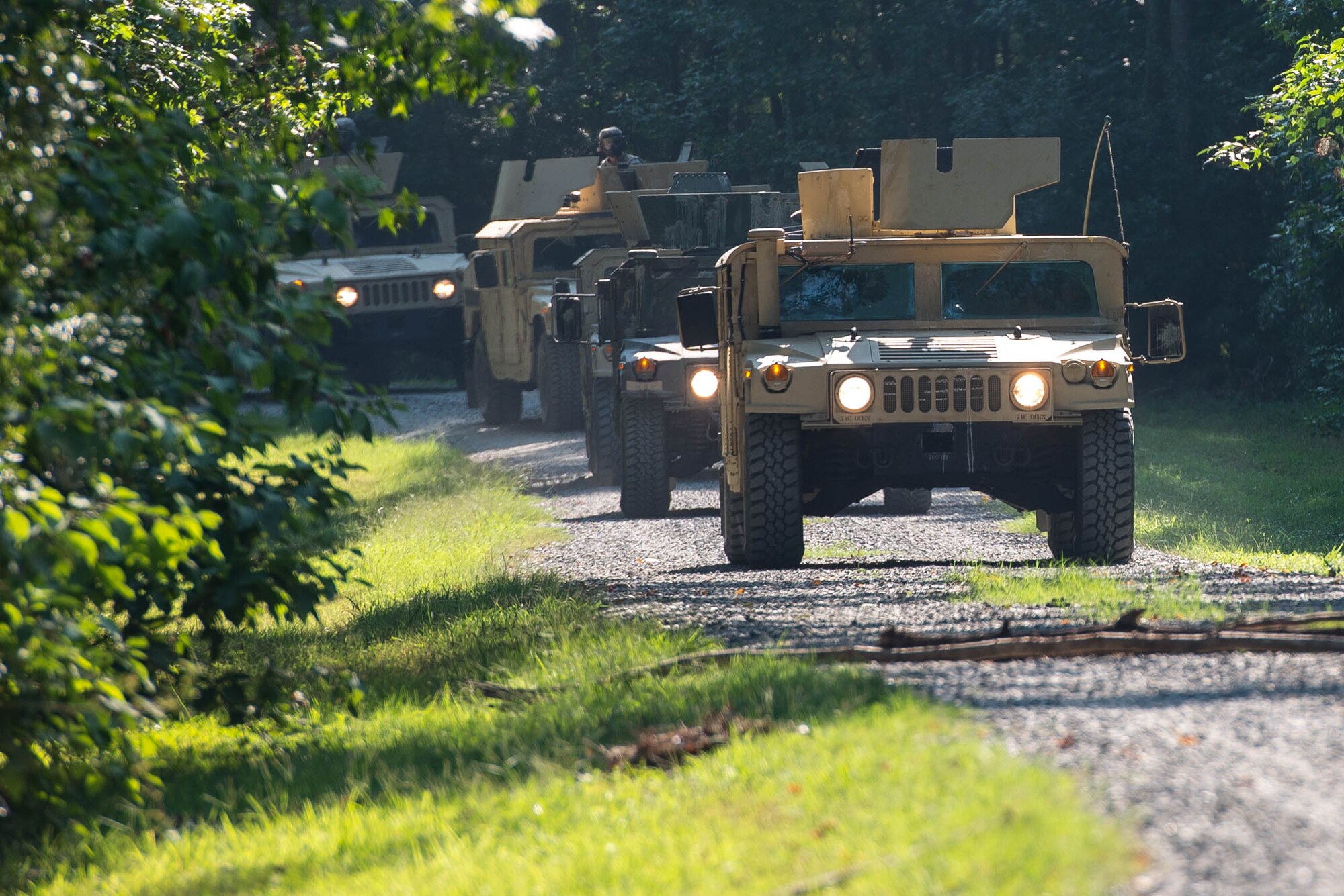 A U.S. Army convoy prepares to enter a town during an Advanced Leadership Course field training exercise at Fort Eustis, Va., Sept. 1, 2016. Several classmates played opposing forces and coordinated ambushes throughout the town to test the classes skills learned during the course. (U.S. Air Force photo by Airman 1st Class Derek Seifert)