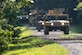 A U.S. Army convoy prepares to enter a town during an Advanced Leadership Course field training exercise at Fort Eustis, Va., Sept. 1, 2016. Several classmates played opposing forces and coordinated ambushes throughout the town to test the classes skills learned during the course. (U.S. Air Force photo by Airman 1st Class Derek Seifert)
