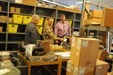 David Graham, right, a heavy mobile equipment repair supervisor for Area Maintenance Support Activity (AMSA) 56, shows Maj. Gen. Patrick Reinert, commanding general of 88th Regional Support Command, and David Fyfe, director of logistics, 88th RSC, look through the rows of vehicle parts stored at the Whitehall, Ohio, facility Aug. 29. Reinert toured AMSA 56 as well as other 88th RSC facilities after he presented AMSA 56 with the Army Chief of Staff Supply Excellence Award.