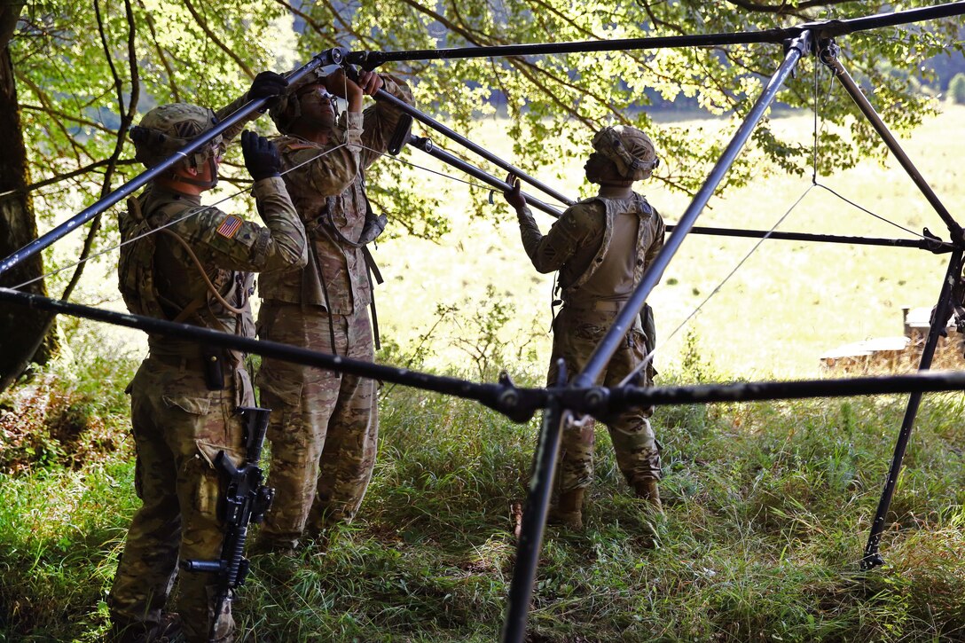 Soldiers assemble a tent frame as part of the Combined Resolve VII exercise at Hohenfels, Germany, Sept. 2, 2016. Army photo by Pfc. Rachel Wilridge