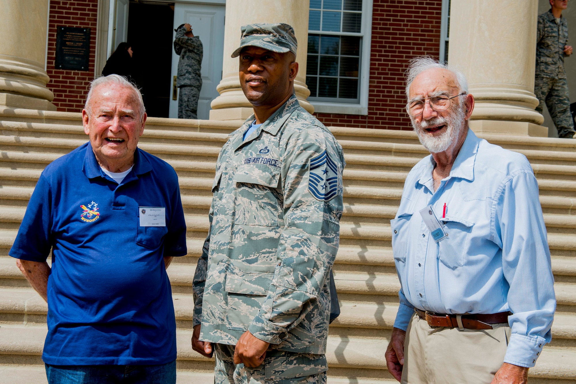 Korean War veterans of the 6147th Mosquitos met with Col. Laura Lenderman, 375th Air Mobility Wing Commander, and Scott Air Force Base Airmen to share their military experiences, Aug. 26, 2016, Scott AFB, Illinois. The Korean War Mosquitos visited Scott to learn about the present day Air Force and the installation, and the members shared their many stories about their jobs and missions as radio operators and pilots during the Korean War. (U.S. Air Force photo by Senior Airman Joshua Eikren)