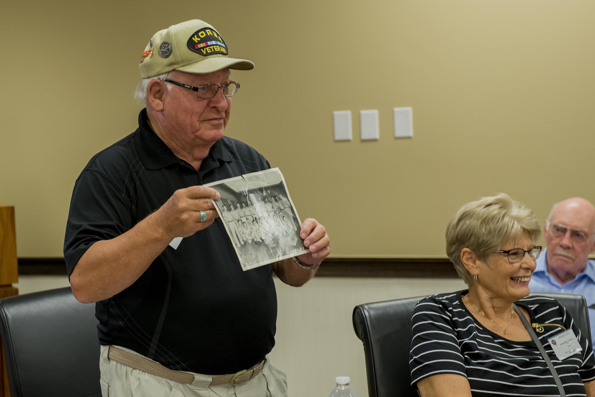 Korean War veterans of the 6147th Mosquitos met with Col. Laura Lenderman, 375th Air Mobility Wing Commander, and Scott Air Force Base Airmen to share their military experiences, Aug. 26, 2016, Scott AFB, Illinois. The Korean War Mosquitos visited Scott to learn about the present day Air Force and the installation, and the members shared their many stories about their jobs and missions as radio operators and pilots during the Korean War. (U.S. Air Force photo by Senior Airman Joshua Eikren)