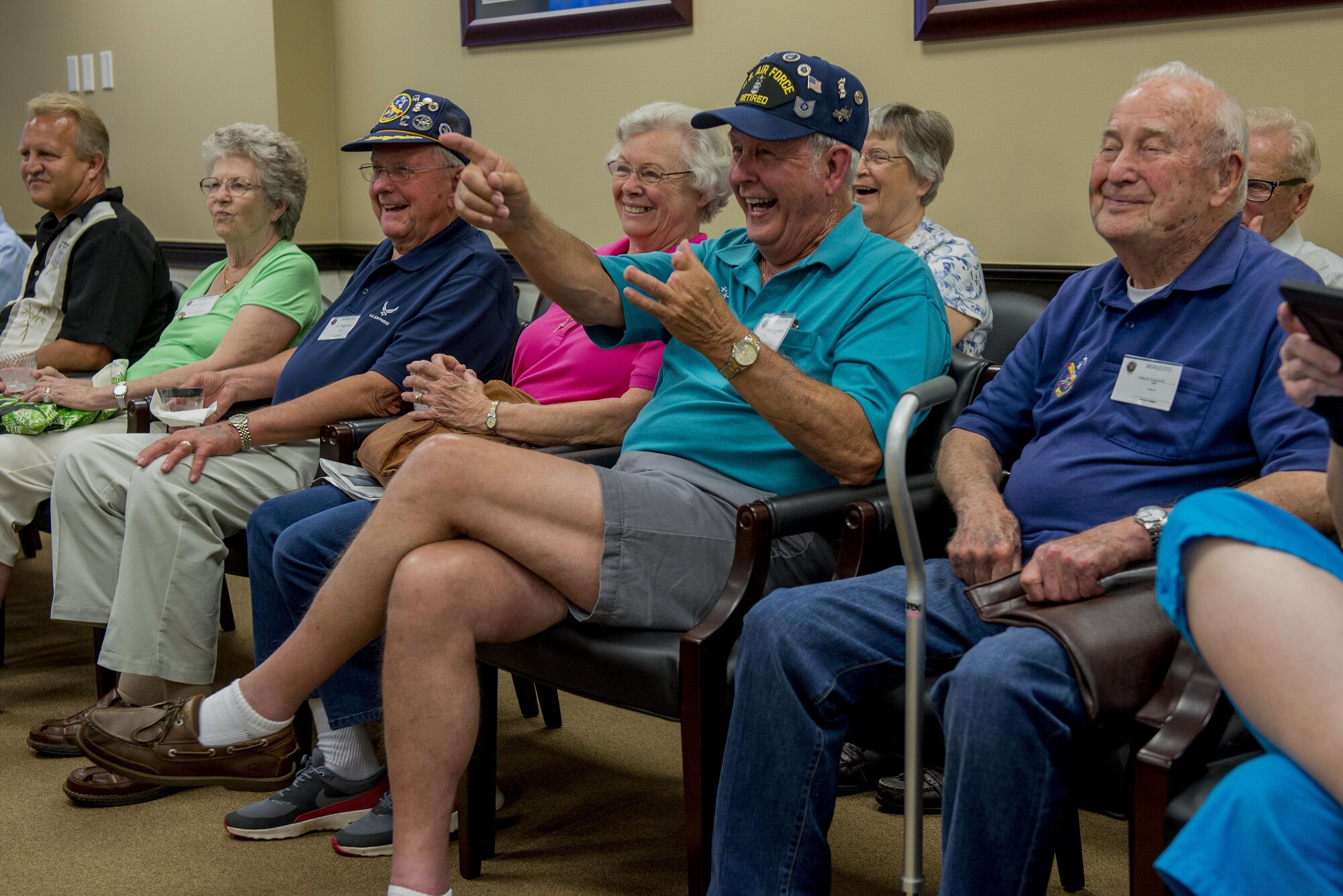 Korean War veterans of the 6147th Mosquitos met with Col. Laura Lenderman, 375th Air Mobility Wing Commander, and Scott Air Force Base Airmen to share their military experiences, Aug. 26, 2016, Scott AFB, Illinois. The Korean War Mosquitos visited Scott to learn about the present day Air Force and the installation, and the members shared their many stories about their jobs and missions as radio operators and pilots during the Korean War. (U.S. Air Force photo by Senior Airman Joshua Eikren)